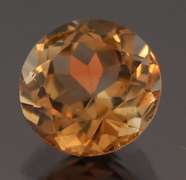 Exciting 3.47ct 9mm Imperial Topaz solitaire