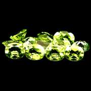 Dazzling 4.44ct untreated lime green Peridot set
