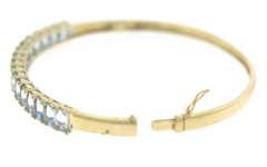 Glamorous 14kt Yellow Gold Hinged Blue Topaz Bangle Bracelet