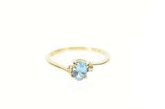 10K Yellow Gold Oval Blue Topaz Diamond Accent Bypass Ring