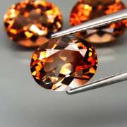 Holy smokes! Its 3 10x8mm Imperial Topaz!