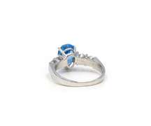 Lovely White Gold Blue Topaz and Diamond Ring