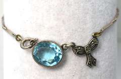 Sweet Blue Topaz & Bow Bracelet in Sterling Silver