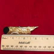 18k gold and platinum , diamond and onyx brooch