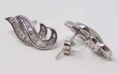Fancy White Gold Diamond Swirl Earrings