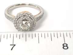 Stunning 1.00CTW Diamond Halo Ring in 14KT White Gold