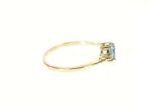 10K Yellow Gold Oval Blue Topaz Diamond Accent Bypass Ring