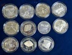 Lot of 11 Commemorative Silver Dollars