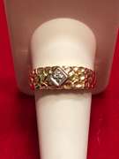 MEN'S 10K GOLD AND DIAMOND CUT RING