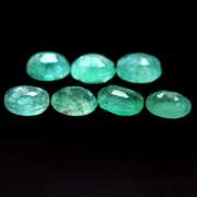 Bright emerald green 7.05ct 7pc emerald set