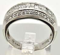 LADIES 14 KT WHITE GOLD DIAMOND BAND BY LEVIAN.
