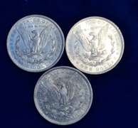 Lot Of 3 AU Morgan Dollars