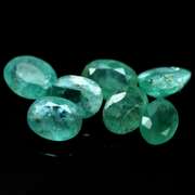 Bright emerald green 7.05ct 7pc emerald set