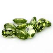 Dazzling 4.10ct untreated lime green Peridot set