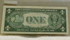 1935-E $1.00 Silver Cert,  GEM Unc