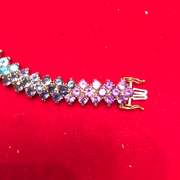Ladies 14k gold bracelet with multi color gem stones