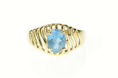 14K Yellow Gold Oval Blue Topaz Wavy Pattern Statement Ring