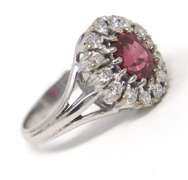 Tasteful White Gold Salmon Spinel & Diamond Halo Ring