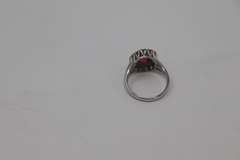 Tasteful White Gold Salmon Spinel & Diamond Halo Ring