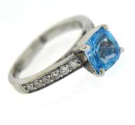 Stunning 14kt White Gold Blue Topaz and Diamond Ring