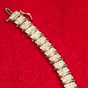 LADIES 14K GOLD AND DIAMOND BRACELET