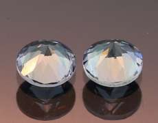 Glittering 1.49ct pair of silvery blue Tanzanite