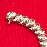 LADIES 14K GOLD AND DIAMOND BRACELET