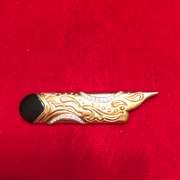 18k gold and platinum , diamond and onyx brooch