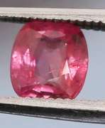 High quality .65ct cushion cut Ruby solitaire