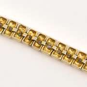 Enticing Tennis Bracelet in Gilt Sterling Silver.