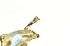 10K Yellow Gold Oval Blue Topaz Jumping Dolphin Pendant
