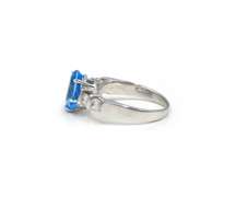 Lovely White Gold Blue Topaz and Diamond Ring