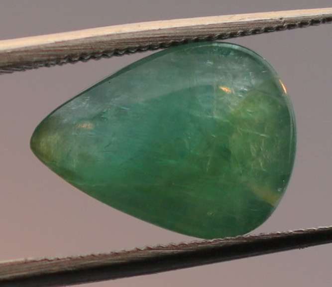 Eye catching 3.24ct forest green Grandidierite cabochon