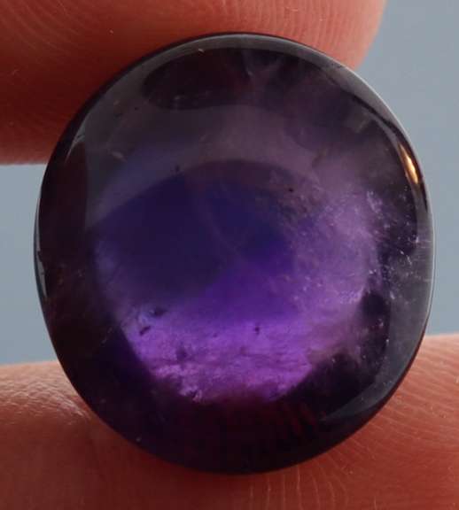 Glistening 17.89ct untreated Amethyst cabochon