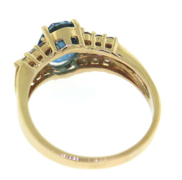 Charming Blue Topaz and Diamond Yellow Gold Ring