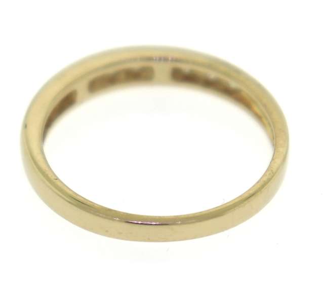 Elegant 14kt Yellow Gold Channel Set Diamond Band