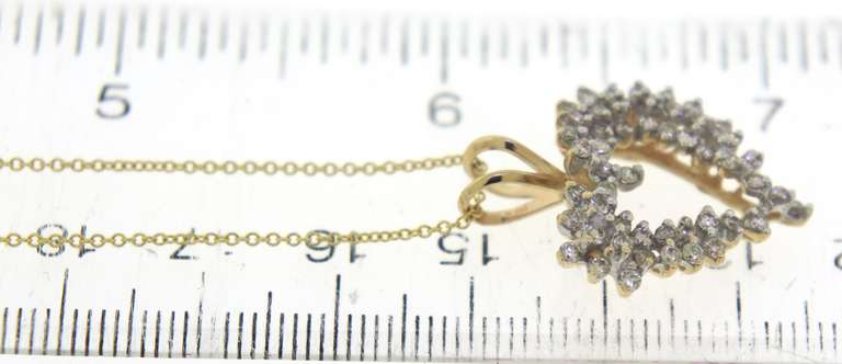 Charming 14kt Yellow Gold Diamond Cluster Open Heart Necklace