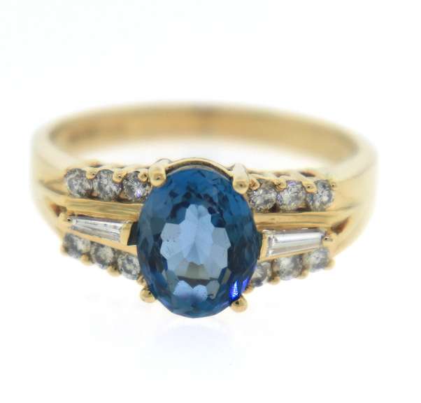 Charming Blue Topaz and Diamond Yellow Gold Ring