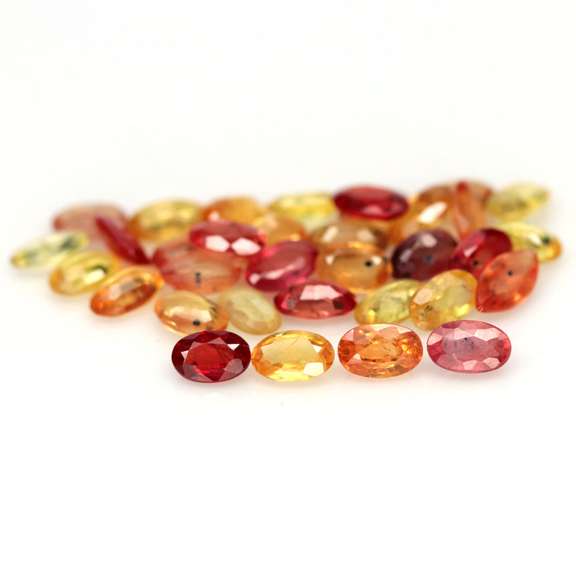 Heated only! 9.61ct fancy color Sapphire set