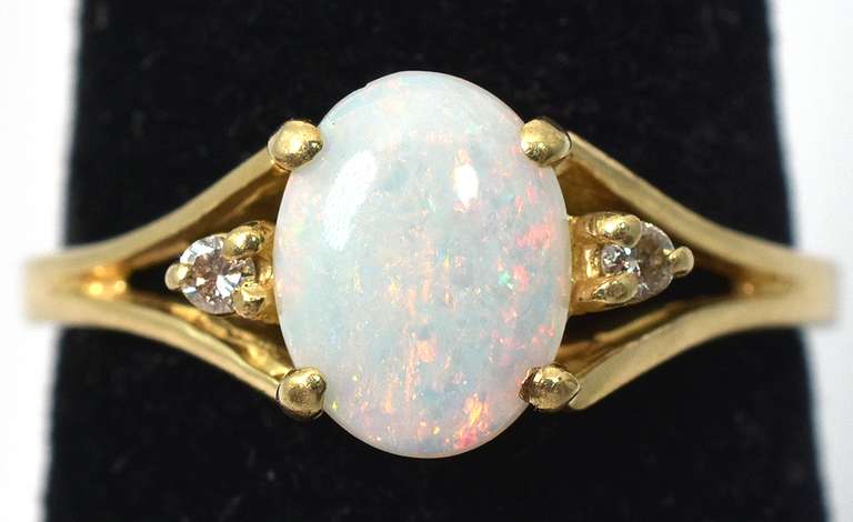 Charming Opal Ring in Yellow Gold