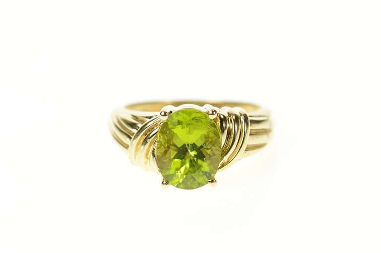 10K Yellow Gold Spiral Twist Pattern Peridot Solitaire Ring