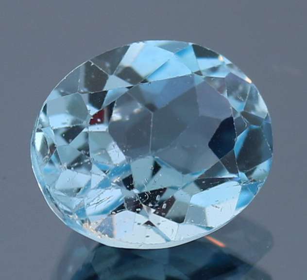 Simply stunning 6.09ct 10x12mm vivid sky blue Topaz