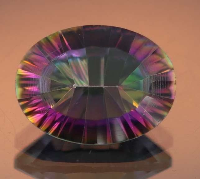 Rainbow color 7.31ct concave cut Mystic Quartz