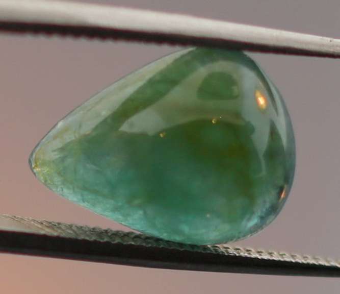 Eye catching 3.24ct forest green Grandidierite cabochon