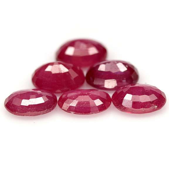 Heavy 9.50ct oval cut Ruby set