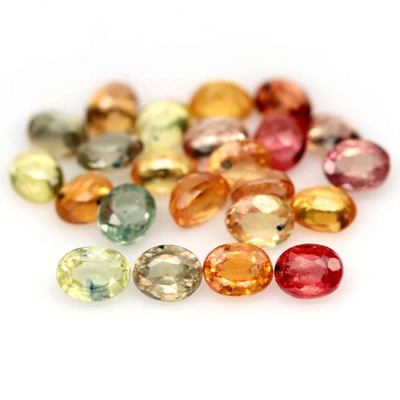 Heated only! 7.02ct fancy color Sapphire set