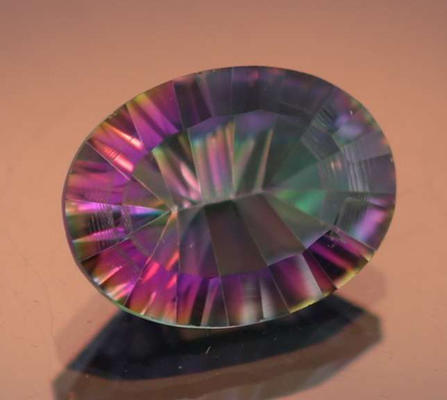 Rainbow color 7.31ct concave cut Mystic Quartz