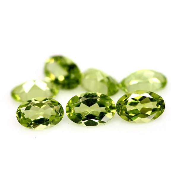 Dazzling 3.19ct untreated lime green Peridot set