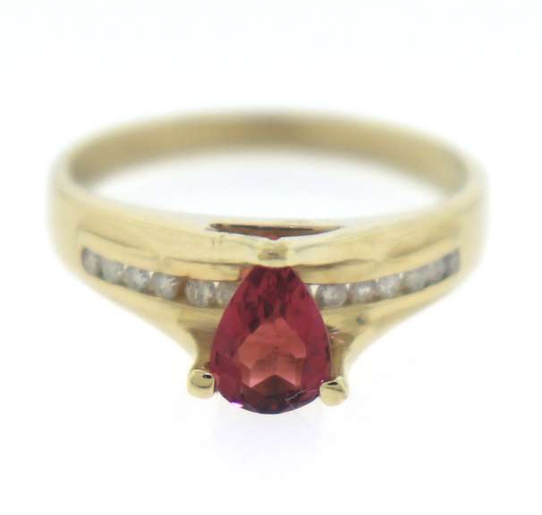 Wonderful Yellow Gold Pear Cut Pink Stone Ring