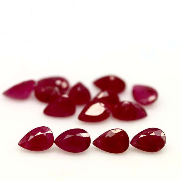 Heated only! 8.69ct violet red Ruby set
